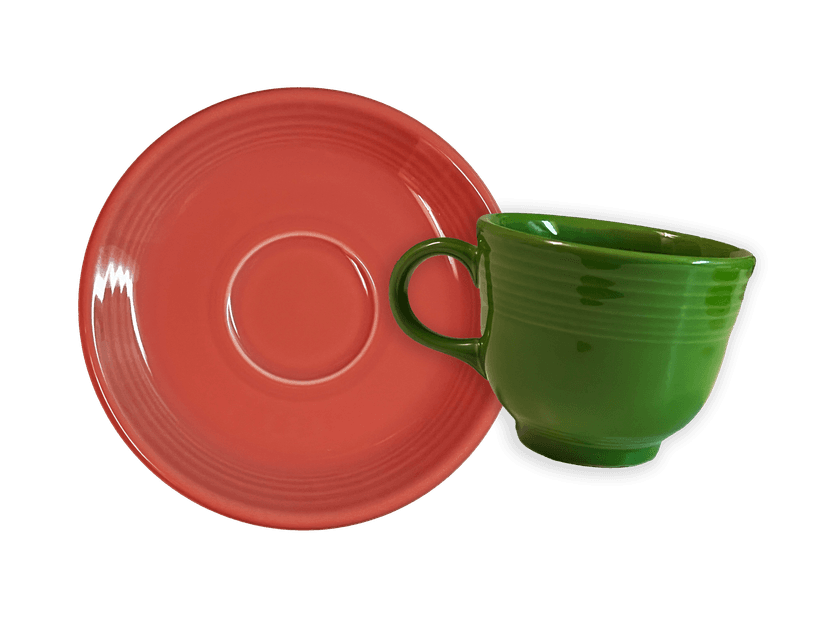 A cutout photo of a fiestaware plate and mug