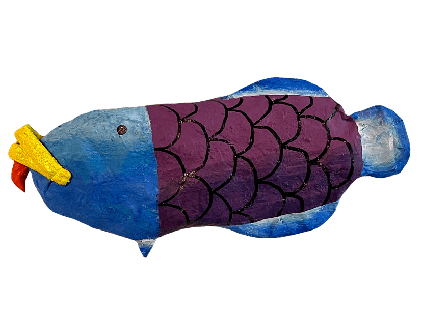 A photo of a colorful paper mâché fish.