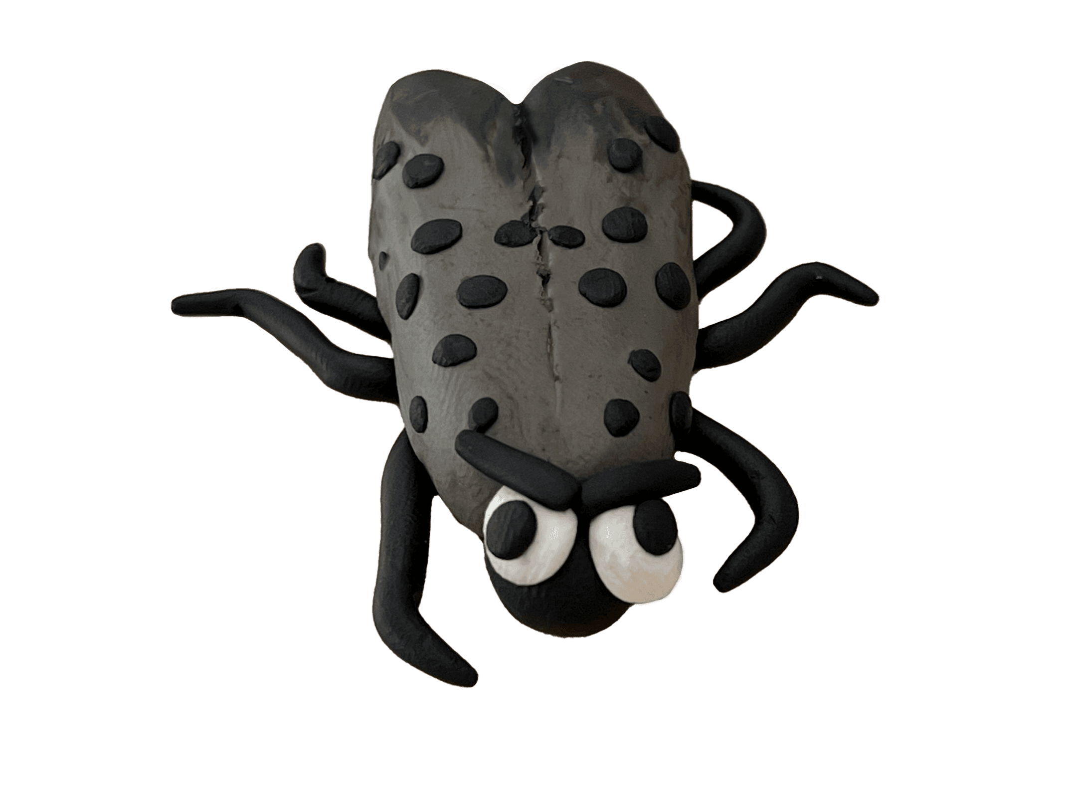 Clay dragonfly sculpture